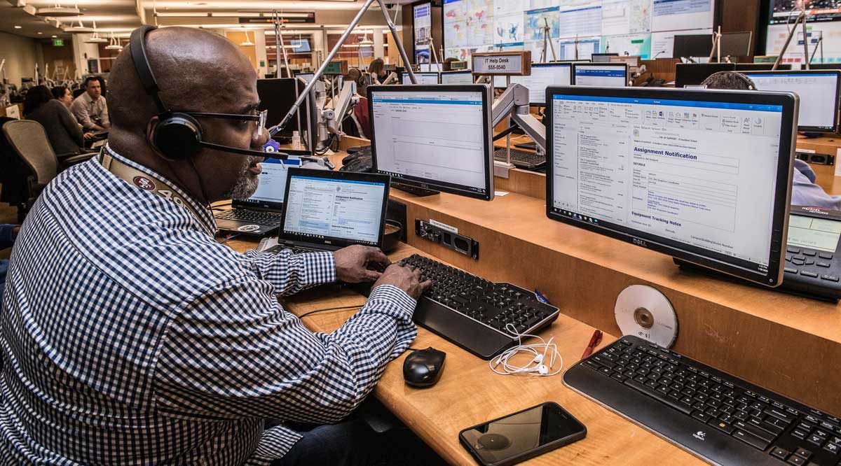 A support engineer working through a service desk queue